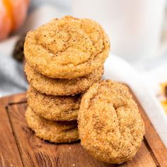 pumpkin spicer cookies stacked on top of each other with the words easy pumpkin snickerdoodle cookies