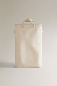 a white bag sitting on top of a table