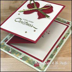 a close up of a christmas card with a bow on the front and bottom of it