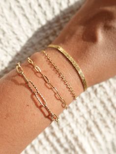 The Vibes Delicate Gleam Clasp Bracelet is the epitome of understated elegance. Its minimalist design and gleaming finish make it a versatile accessory for any outfit. Crafted from 18K gold-plated stainless steel, this bracelet is durable, water-proof, and tarnish-free, ensuring long-lasting shine and beauty. Product Code: DB2201K Collection: Vibes Type: Clasp Material: 18K Gold-Plated Stainless Steel Dimensions: Length 16-19cm Pendant Dimensions: Style: Minimalist Includes: Gold Minimalist Chain Bracelet With Simple Design, Minimalist Gold Chain Bracelet With Simple Design, 14k Gold Bracelets For Everyday Elegance, Gold Minimalist Chain Bracelet, Delicate Gold Jubilee Bracelet For Everyday Wear, Everyday Simple Chain Bracelet, Everyday Simple Design Chain Bracelet, Delicate Jubilee Gold Bracelet For Everyday Wear, Delicate Jubilee Gold Bracelet For Everyday