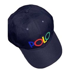 Polo Ralph Lauren Hat With Multi Color Polo Logo, Color R Blue, Red, Yellow, Green And Adjustable Stripes On Black With Pony Logo Trendy Blue Hats With Embroidered Logo, Casual Multicolor Hat With Embroidered Logo, Multicolor Cap With Embroidered Logo, Casual Multicolor Flat Brim Baseball Cap, Multicolor Embroidered Logo Cap, Trendy Blue Baseball Cap With Short Brim, Ralph Lauren Bucket Hat, Ralph Lauren Hat, Navy Blue Hat