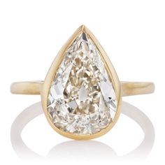 The Zinfandel 4.08 ring is a VB original design made right here in NYC. The ring centers a GIA-certified 4.08-carat pear cut diamond of K color, SI2 clarity. The stone is bezel-set in an 18kt yellow gold setting. Pear Cut Diamond Engagement Ring, Victor Barbone Jewelry, Victor Barbone, Teardrop Diamond, Pear Cut Engagement Rings, Flawless Diamond, Zinfandel, Pear Cut Diamond, Yellow Gold Setting