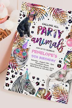 an animal themed birthday party with zebras, giraffes and other animals