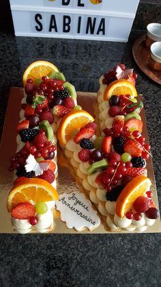 a number made out of fruit on top of a table