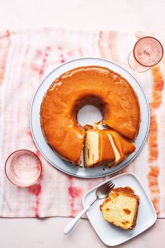 a bundt cake on a plate with a slice cut out