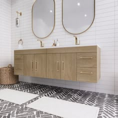 a bathroom with two sinks and mirrors on the wall next to a rug in front of it