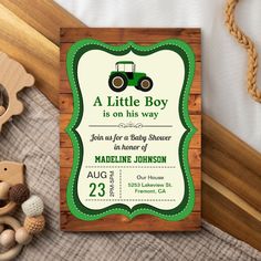 a little boy is on his way baby shower with tractor theme and green trimmings