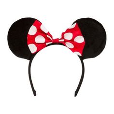 a minnie mouse ears headband with red and white polka dots on the ears,