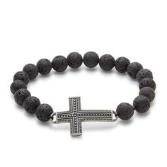 Up your style game with this Men's Lava Rock Antiqued Cross Bead Bracelet.  Lava stone is a calming stone that gives mental and physical strength and clarity when facing difficult situations.  Adorned with a 1 1/4" stainless steel cross  this stretch bracelet easily slides on and off your wrist and is strung with black lava rock beads for a natural rugged texture.  Wear this bracelet solo or layer with one of our many men's leather bracelets. Casual Hand-strung Beaded Bracelets With Lava Stone, Casual Hand-strung Lava Stone Beaded Bracelets, Spiritual Lava Stone Bracelets With 8mm Beads, Spiritual Lava Stone Beaded Bracelets With 8mm Beads, Spiritual Lava Stone Stretch Bracelet With Natural Stones, Silver Beaded Bracelets With 8mm Lava Stone Beads, Casual Stretch Bracelet With 8mm Lava Stone Beads, Silver Lava Stone Beaded Bracelets With 8mm Beads, Casual Lava Stone Bracelet With Natural Stones