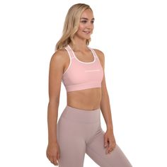 Get the perfect bra for your workouts! This comfy lovable cuties pink bra has a soft moisture-wicking fabric, extra materials in shoulder straps, and removable padding for maximum support. • 82% polyester, 18% spandex • Fabric weight: 6.78 oz/yd² (230 g/m²), weight may vary by 5% • Sports mesh lining: 92% polyester, 8% spandex • Padding: 100% polyurethane perforated foam and 100% polyester moisture-wicking fabric • Four-way stretch material • Scoop neckline and racerback • Support material in shoulder straps, and a wide elastic under breasts • Best for A–C cups • Removable padding included • Mesh lining with slits for removing paddings • Flat seams and bias binding that eliminate rubbing This product is made especially for you as soon as you place an order, which is why it takes us a bit l Pink Sports Bra With Stretch, Pink Fitted Gym Bra, Pink Yoga Bra With Medium Bust Support, Pink Nylon Activewear With Light Support, Supportive Sports Bra In Pink, Pink Racerback Bra For Gym, Pink Racerback Gym Bra, Pink Sports Bra For Athleisure, Pink Athleisure Bra With Light Support