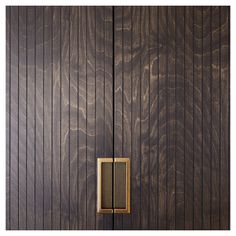 a close up of a wooden door with a light switch on the front and side