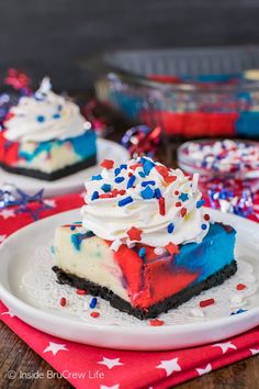 a slice of patriotic cheesecake on a plate with red, white and blue sprinkles