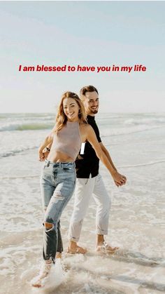 a man and woman are walking in the water with a quote on it that says i am blessed to have you in my life