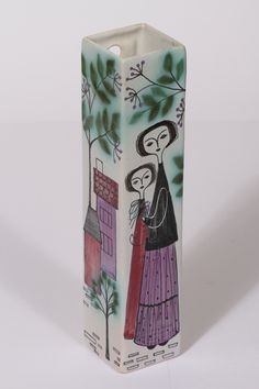 a tall vase with two women on it