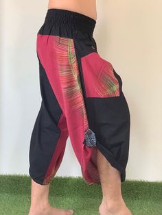 "Male Model Tall 5'9\" Waist 34\" Samurai Pants - elastic waistband and cuffs - Fits all! Unisex pants These beautiful casual pants is unique & comfortable to wear Handmade with a very lovely pattern, it is easy to wear and great for many occasions. One size fits most. These pants are great for many different activities like traveling, dancing, going to festivals, rock climbing, yoga, meditation, massage, working out, martial arts, Taichi MATERIAL: 100% Cotton APPROX MEASUREMENT: Waist: 24\" Black Patchwork Bottoms For Festival, Traditional Harem Pants For Yoga With Pockets, Traditional Full-length Harem Pants For Festival, Red Wide-leg Harem Pants With Pockets, Baggy Wide-leg Harem Pants For Meditation, Men’s Harem Pants, Yoga Harem Pants, Samurai Pants, Handmade Pants