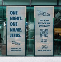 two signs on the side of a building that say one night, one name jesus