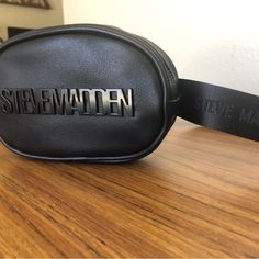 Nwt Black Steve Madden Logo In The Front Fanny Pack Same Style As The Tiktok Viral Bag Bevelyn And Satchel Trendy Black Shoulder Bag With Logo, Trendy Belt Bag With Adjustable Strap For Errands, Tiktok Viral, Steve Madden Bags, Same Style, Fanny Pack, Belt Bag, Steve Madden, Satchel