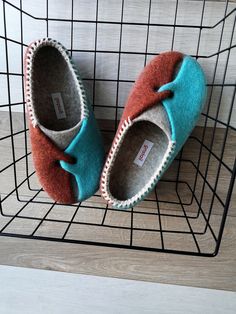 "Felted wool slippers \"Winter\" from SEASONS 23/24 collection. Unique design. Slippers in turquoise blue and rusty brown for men and women. Made to custom order. SLIPPERS - WINTER from collection \"SEASONS\" 23/24 Are you more drawn to the tranquillity of autumn or the vibrancy of spring?  Our latest SEASon-S collection delves into the beauty of the seasons, the allure of colours, and the essence of self-discovery.  Ever wondered why you favour one colour over another or why you resonate with t Knitted Wardrobe, Felted Wool Slippers, Brown Slippers, Felt Slippers, Wool Slippers, Felted Slippers, Designer Slippers, One Colour, Blue And Brown