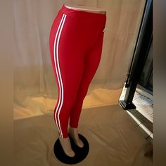 Indero Red Side Stripped Soft Leggings 3 S/M-2 L/Xl Trendy Red Activewear For Sports, Red Trendy Leggings, Trendy Red Sports Activewear, Fitted Red Leggings For Loungewear, Casual Red Pants For Workout, Casual Red Pants With Three Stripes, Trendy Fitted Red Activewear, Red Three Stripes Sporty Activewear, Red Sporty Activewear With Three Stripes