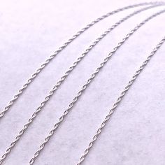 These Italian solid sterling silver rope chains or serpentine rope chains are an elegant way to display any pendant. This chain doesn't need a pendant to look beautiful. Wearing this chain by itself has a look of class unparalleled to many silver chains. The Italian production of this chain ensures strength and durability. Compared to the competition on Etsy and other platforms, there is no rival to these Italian made chains. Available in two different sizes for your convenience. Silver Minimalist Rope Chain Necklace As Gift, Minimalist Silver Rope Chain Necklace As Gift, Minimalist Silver Rope Chain Necklace For Gift, Silver Rope Chain Necklace With Cable Chain For Gifts, Silver Rope Chain Necklace Gift, Silver Cable Chain Rope Necklace For Gifts, Silver Cable Chain Rope Necklace Gift, Minimalist Sterling Silver Rope Chain Necklace, Silver Link Rope Chain Necklace Gift