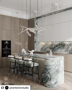 an elegant kitchen with marble counter tops and bar stools in the middle of it