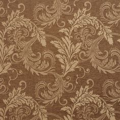 a brown and beige floral pattern on fabric