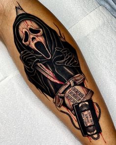 a person with a tattoo on their arm holding a bottle and a knife in his hand