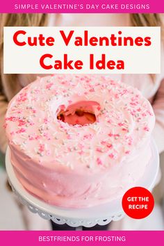 a cake with pink frosting and sprinkles on it is featured for valentine's day