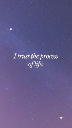 the words i trust the process of life against a night sky