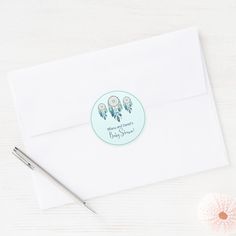 an envelope with a sticker that says baby shower