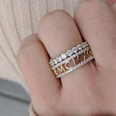 Our 14k, 18k gold open back diamond eternity roman numeral ring is fully personalized with any text, date, symbol you want and features two full eternity rows of high quality diamonds. It's perfect for Valentine's Day, weddings, engagements and anniversaries. View a video of this ring on Instagram: https://www.instagram.com/p/BqxjRO2BwYS/ Rose gold version of this ring: http://etsy.me/1M4eRBc White gold version of this ring: http://etsy.me/1kKjwyU Closed back version of this ring: http://etsy.me Roman Numeral Wedding Band, Luxury Stackable Eternity Band For Promise, Luxury Stackable Promise Eternity Band, Luxury Eternity Band With Diamond Accents For Promise, Luxury Stackable Eternity Band For Anniversary, Luxury Brilliant Cut Initial Ring For Anniversary, Luxury Wedding Initial Ring With Cubic Zirconia, Personalized Diamond Stackable Rings For Anniversary, Personalized Luxury Diamond Ring For Anniversary