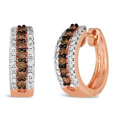 From Le Vian(R), these delicious hoop earrings are fashioned in 14k Strawberry Gold(R) and drips with Chocolate Diamonds(R) framed by a Vanilla Diamonds(R) border. Chocolate and Vanilla Diamonds(R) are 5/8ctw and SI2 in clarity. Natural fancy brown diamonds are available in shades from champagne to cognac to Chocolate Diamonds(R), Le Vian(R)'s original brand of natural fancy color brown diamonds. Chocolate Diamonds(R) are naturally flavored, the depth of their color determined by the tremendous Brown Diamonds, Chocolate Diamonds, Diamond Frame, Le Vian, Gold Top, Brown Diamond, Gold Hoop Earrings, Cognac, Champagne