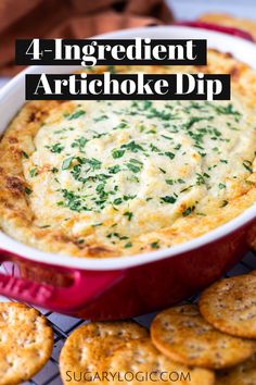 an artichoke dip in a red dish with crackers around it and the words, 4 ingredient artichoke dip