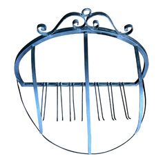 a metal rack holding several pairs of scissors on it's sides and an oval shaped handle