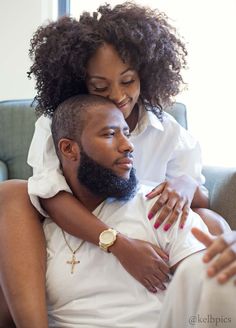 a woman hugging a man on the back of a couch with text that reads, when you got someone good if you hold onto them for good