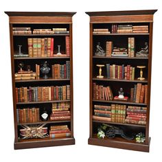 two wooden bookshelves filled with lots of books