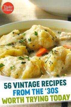 a bowl of soup with dumplings and carrots in it on top of a table