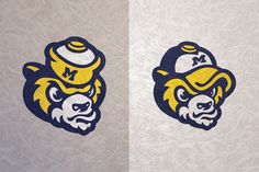 two logos on the side of a wall one has a football helmet and the other has a michigan logo