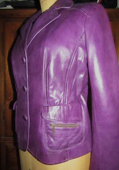 "Scully leather women's jacket is a lovely soft velvet feel mint purple jacket. Perfectly styled to add a Springtime vibe to any wardrobe. Super soft glove feel leather that is just dreamy to feel. This lovely jacket has a semi-fitted bodice that has a darted front for added simple style and to showcase your lovely figure. Twin pockets adorn the front on each side and then have an added zipper to boot for extra security for smaller items and for a little style. This has a very nice satin purple Fitted Purple Leather Jacket For Fall, Soft Gloves, Purple Jacket, Frye Boots, Purple Leather, Leather Jackets Women, Soft Velvet, Fitted Bodice, Simple Style