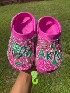 Step into style with our custom Pink and Green AKA Bling Crocs, perfect for any sorority sister or function. These sparkling clogs are a unique and thoughtful gift for her, adding a touch of glam to any outfit. Elevate your footwear game and show off your AKA pride with these dazzling shoes. Sorority Shoes, Croc Designs, Crocs Custom, Bling Crocs, Crocs Fashion