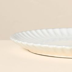 a white plate sitting on top of a table