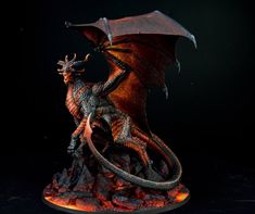 a figurine of a dragon is shown on a black background