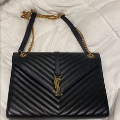 This Is A Classic Piece From The Ysl Collection. Looks Good Dressed Up Or Down. In Good Used Condition. Signs Of Wear On The Sides, But It Is Minimal. 9”H X 12”W X 2.75”D ****Had To Repost This Listing Because An Inconsiderate Buyer Purchased And Then Cancelled Because She Decided She Didn’t Have The Patience For The Bag To Be Authenticated At Poshmark’s Facility.**** Ysl Envelope Medium Bag, Sac Yves Saint Laurent, Bags Ysl, Ysl Clutch, Ysl Makeup, Mini Duffle Bag, Tory Burch Shoulder Bag, Marc Jacobs Sunglasses, White Crossbody Bag