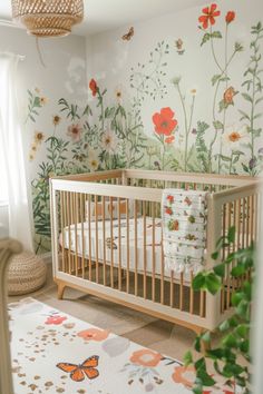 a baby's room with a crib and flower wallpaper on the walls