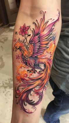 a colorful tattoo on the leg of a woman with an eagle and flowers in it