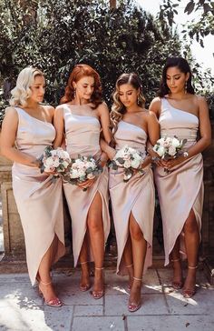 the bridesmaids are wearing different styles of dresses