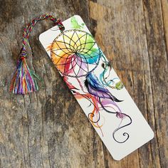 a bookmark with a colorful dream catcher on it