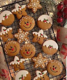 some christmas cookies are on a cooling rack