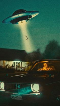 an image of a flying object in the sky above a car and man sitting inside it