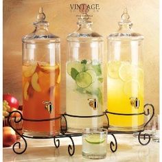 three different types of drinks in glass containers